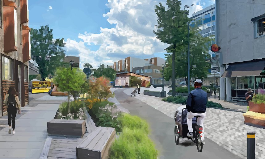 En exemeplbild på hur Värnamo stad skulle kunna se ut om biltrafiken var ej tillåtet genom Lasarettsgatan. På bilden ser vi att husen på gatan har fått ett lyft, gallerian är ny och det är folk som sitter, cyklar och går omringade av massa grönska.